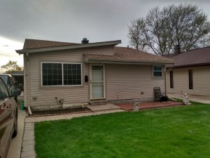 Single family with brown painted roof home for sale in Dudley St. Taylor