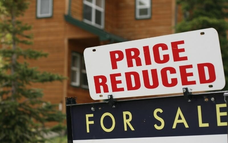 Home For Sale Price Reduced Sign