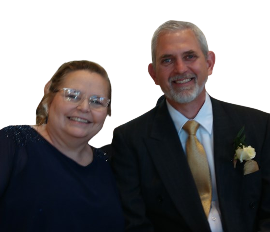 man and woman dressed nice company owners smiling
