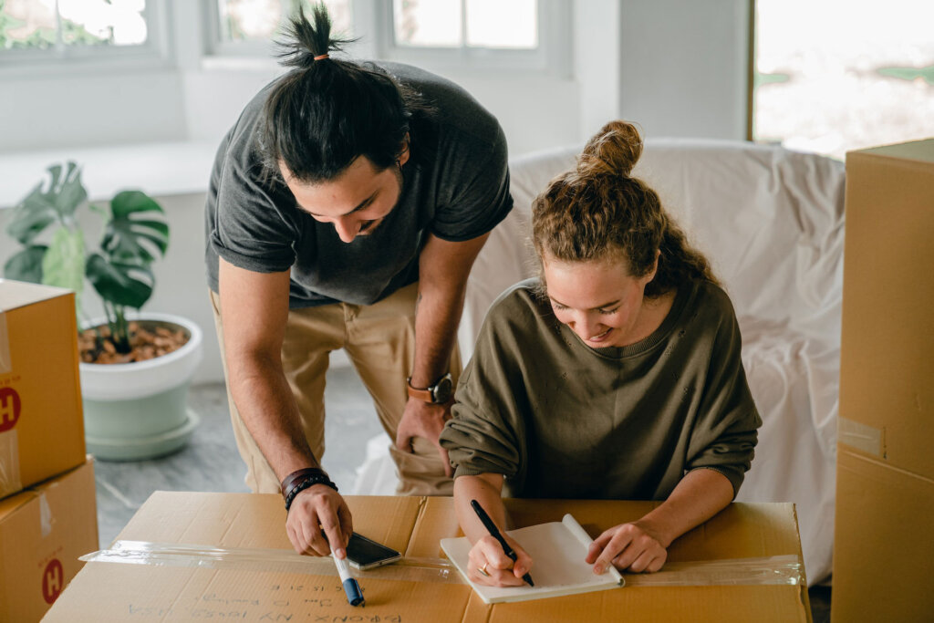 Couple reviewing checklist after moving to south carolina