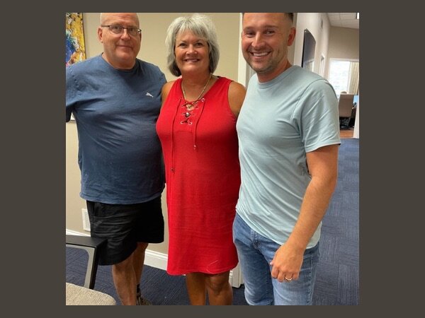 Beau Hollis with Louisville home sellers Fred and Theresa