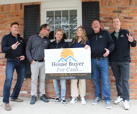 The House Buyer For Cash local real estate team standing together in Toledo, Ohio, ready to buy homes for cash.