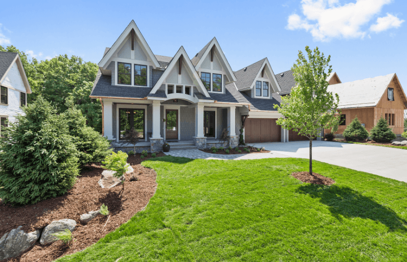 A beautiful suburban house with a recently-landscaped front yard