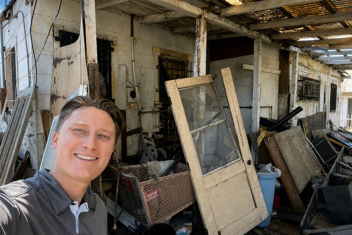 Pat at a San Bernardino fixer upper property purchased by Pat Buys Houses Cash