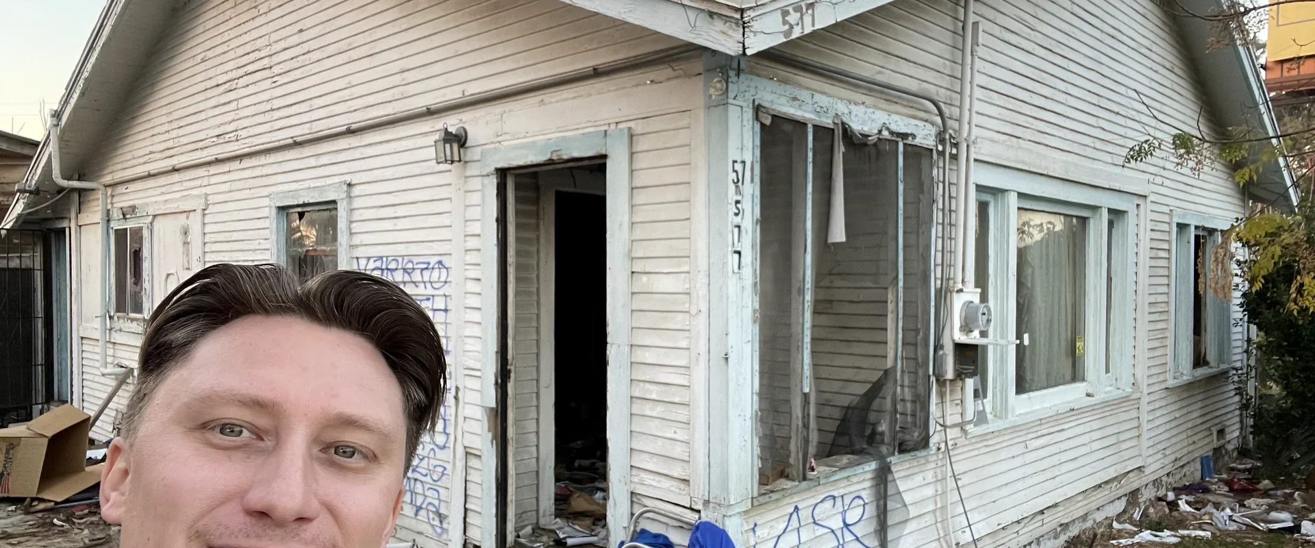 Pat at a San Bernardino fixer upper house purchased by Pat Buys Houses Cash