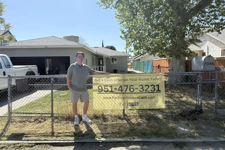 Pat standing at a San Bernardino house purchased by Pat Buys Houses Cash