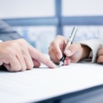 selling home during divorce in TemplateCity | pointing and writing