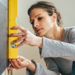 Attract Multiple Offers in a Seller's Market | woman measuring