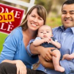 How To Take Advantage Of A Seller's Market | mixed family sold sign
