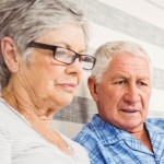 5 Creative Ways To Sell Your Land Online | old couple on laptop