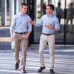 buying investment property | businessmen walking