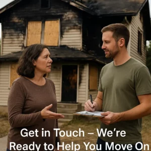 Homeowner speaking with local buyer in front of a fire-damaged house – Contact us to sell your burned home fast in California.