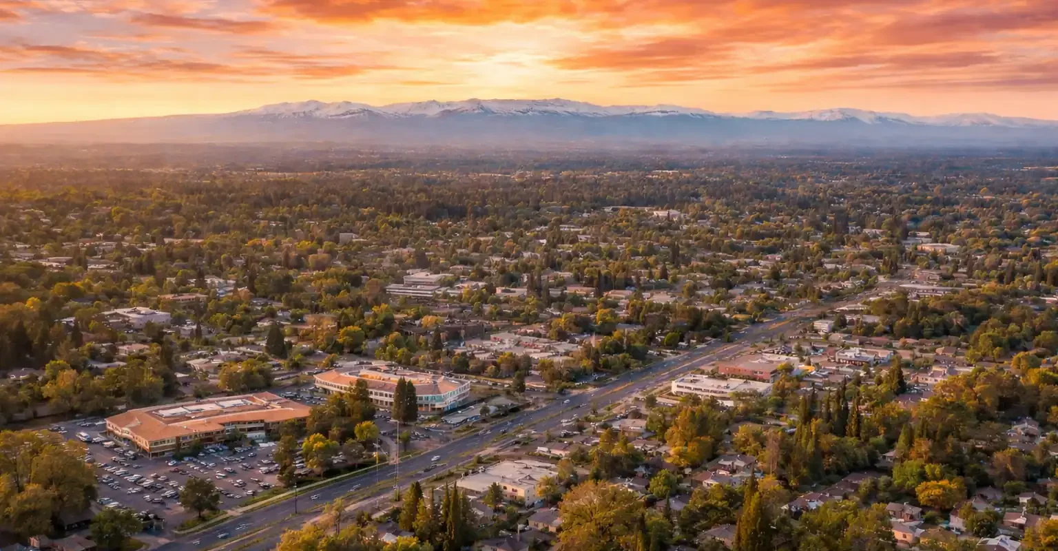 Sunset aerial view of Citrus Heights, California, representing the area where homeowners sell rental properties as-is for cash