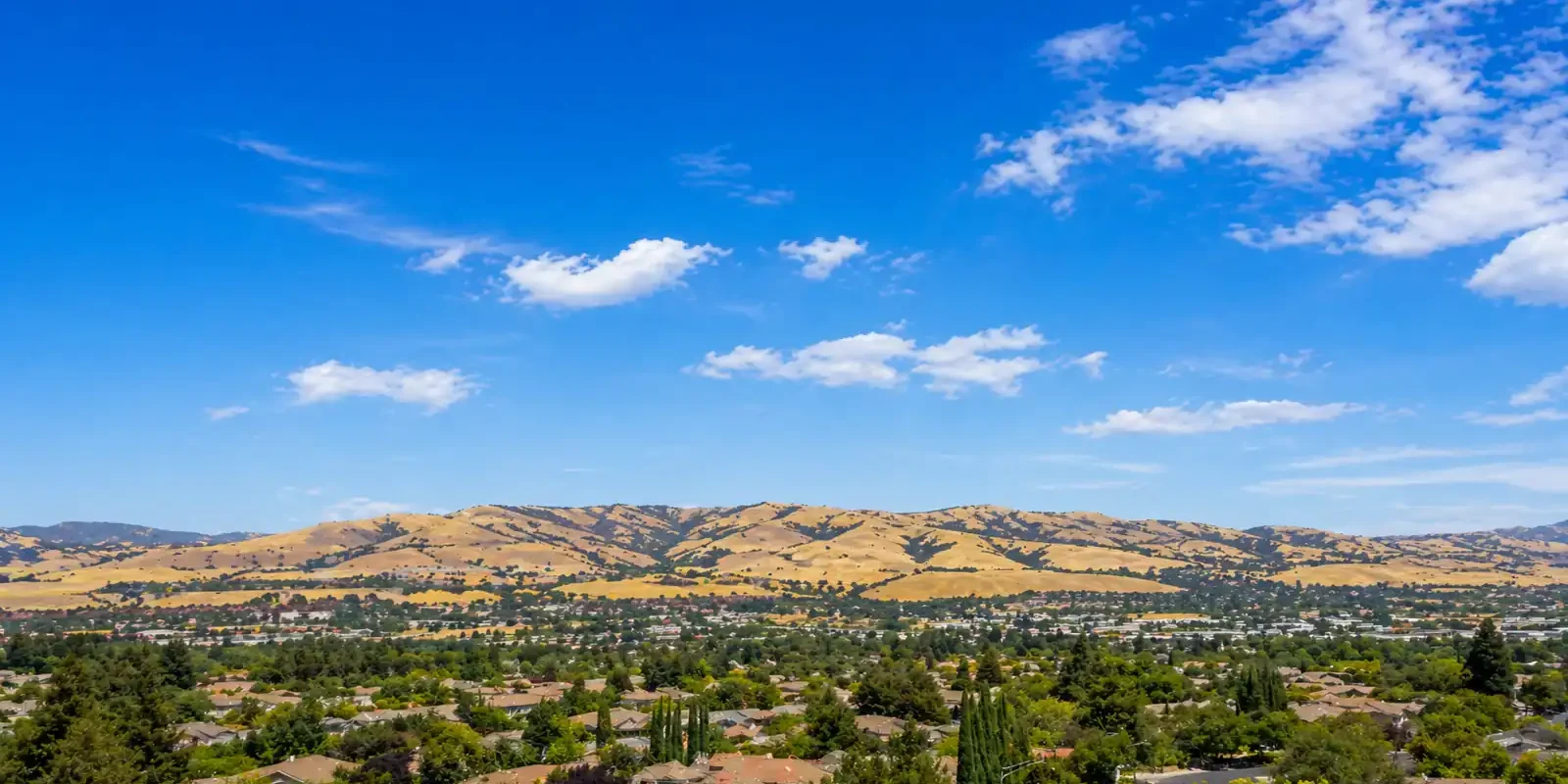 wide view of fairfield california hills and neighborhood under blue sky we buy houses fairfield ca