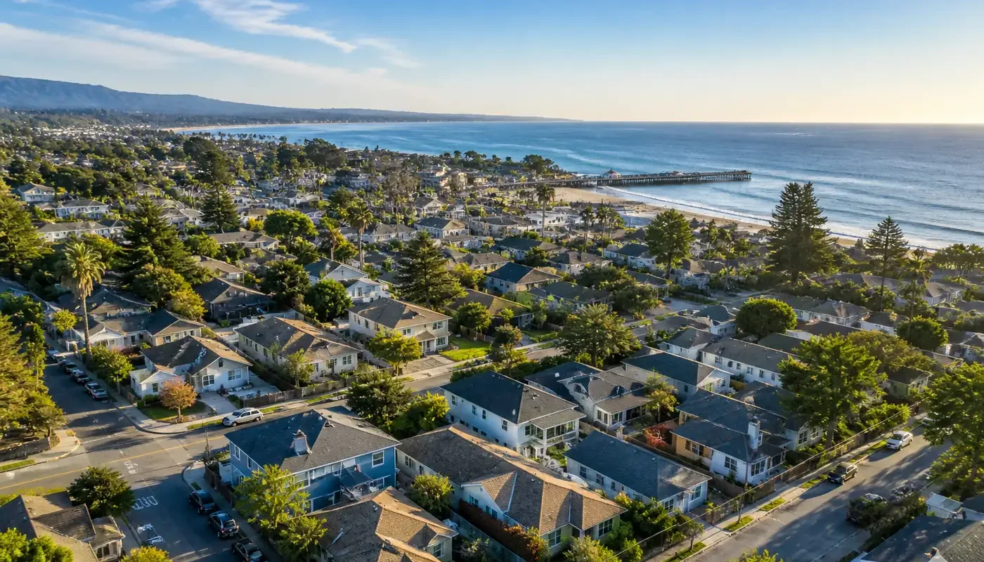 Aerial view of Santa Cruz coastal neighborhood with homes near the ocean where homeowners can sell their house fast for cash