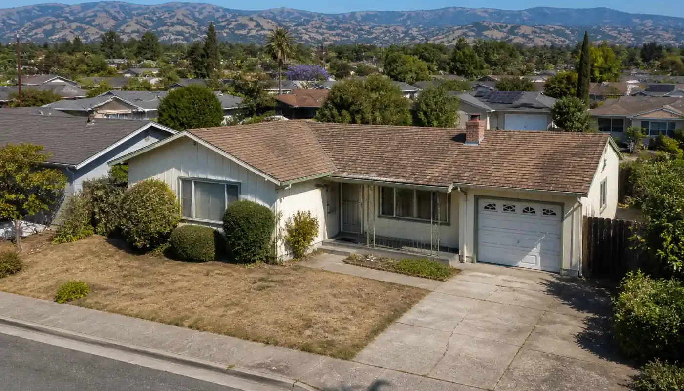 Sell my house fast in probate San Jose CA aerial view of older home