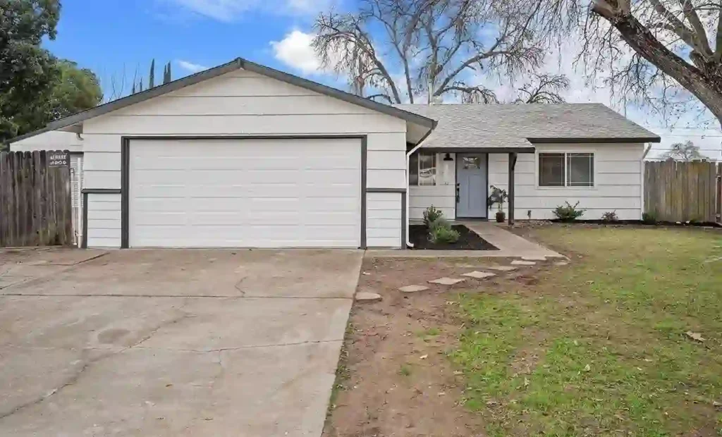 Front exterior of a fully renovated home on Fresno Court in Citrus Heights, California, after remodeling by R&H Distressed Properties.