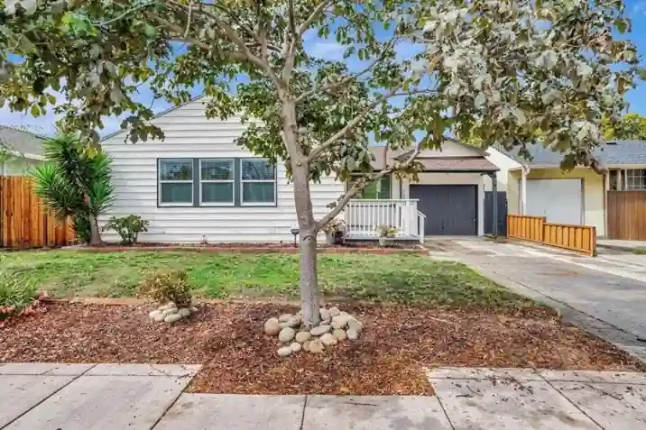 Front exterior of a fully renovated hoarder house in San Lorenzo, California, after a complete remodel by R&H Distressed Properties.