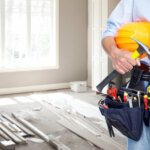 Handyman with a tool belt. House renovation service