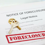 Notice of Foreclosure in Missouri document and house key