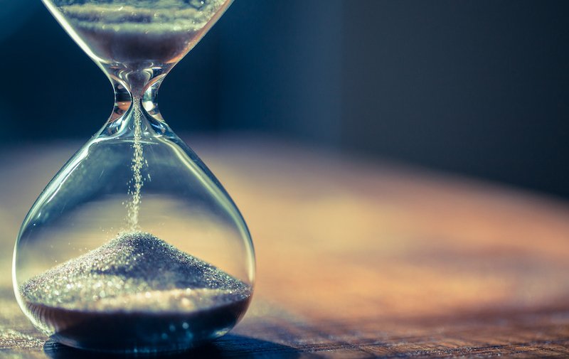 an hourglass half-way through