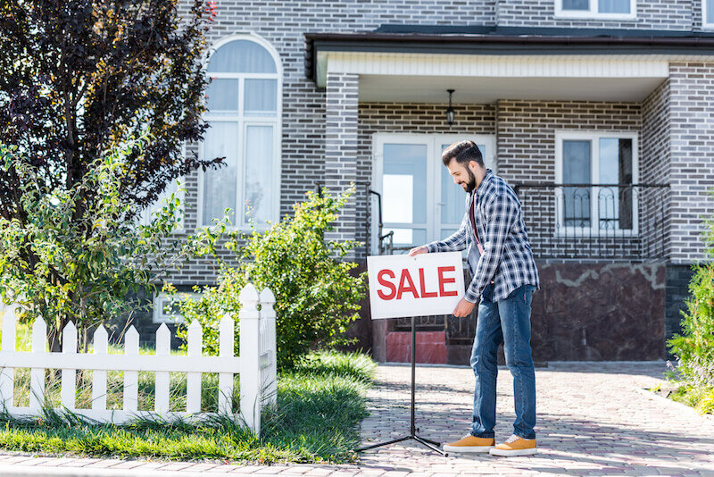 a young selling his house as-is in Houston