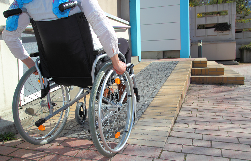 A person in wheelchair entering his house in Idaho.