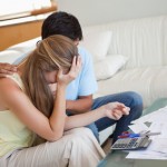 Sad couple in financial trouble and can't sell their house in Hillsboro