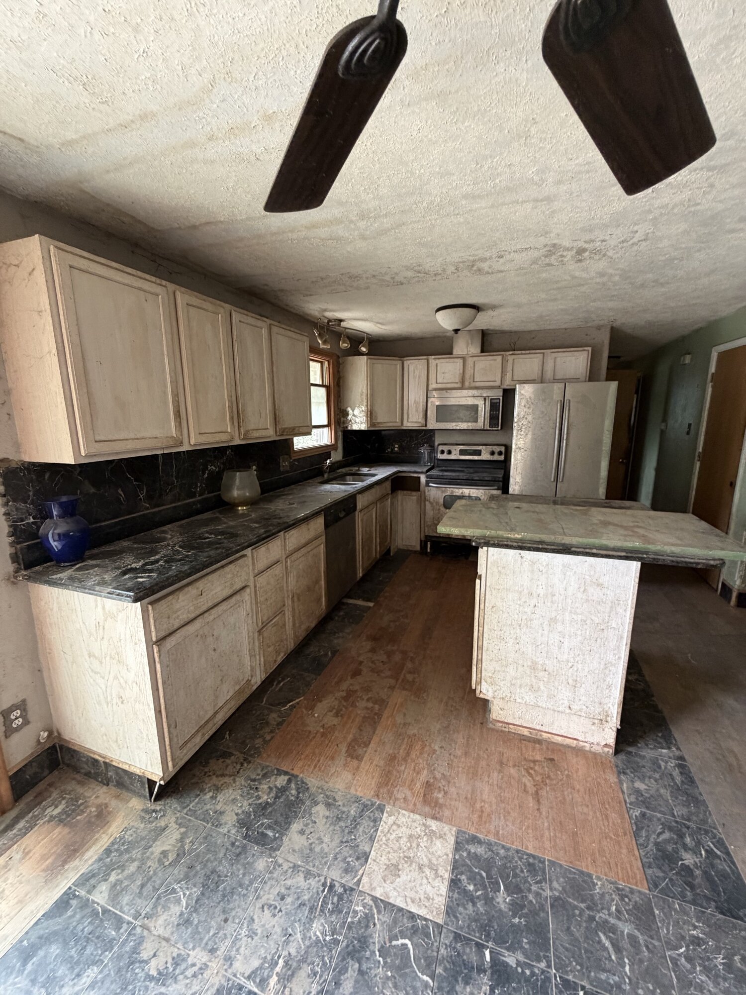 Before: kitchen at 1708 Jewel Dr, Longmont as we found it