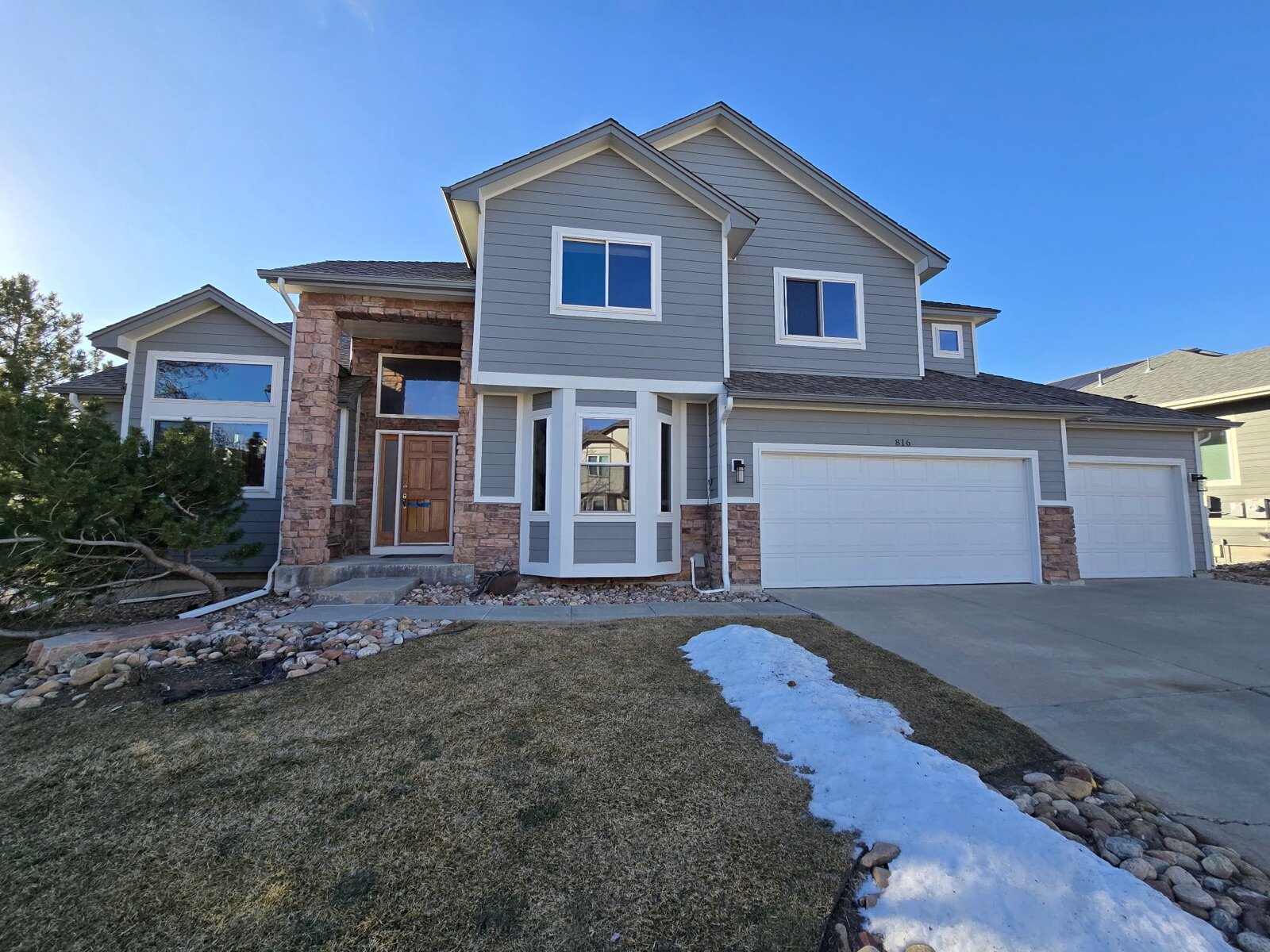 816 Trail Ridge Dr in Louisville the day Boulder Home Buyers bought it, after four years of fire-insurance limbo