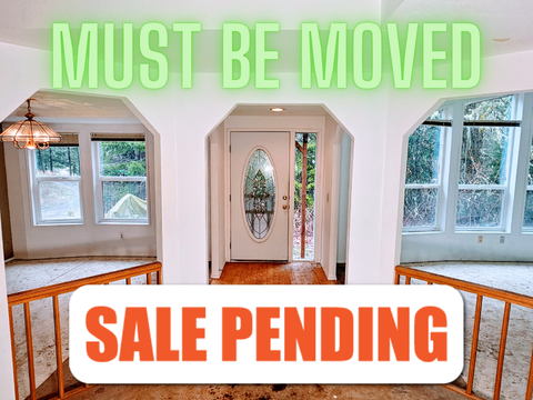 Beautiful Entryway to Mover Manufactured Home With decorative front door and large windows behind archways and the words SALE PENDING.