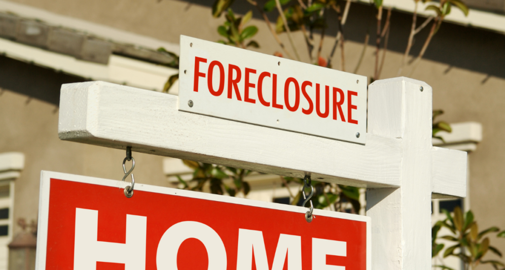 A foreclosure For Sale sign
