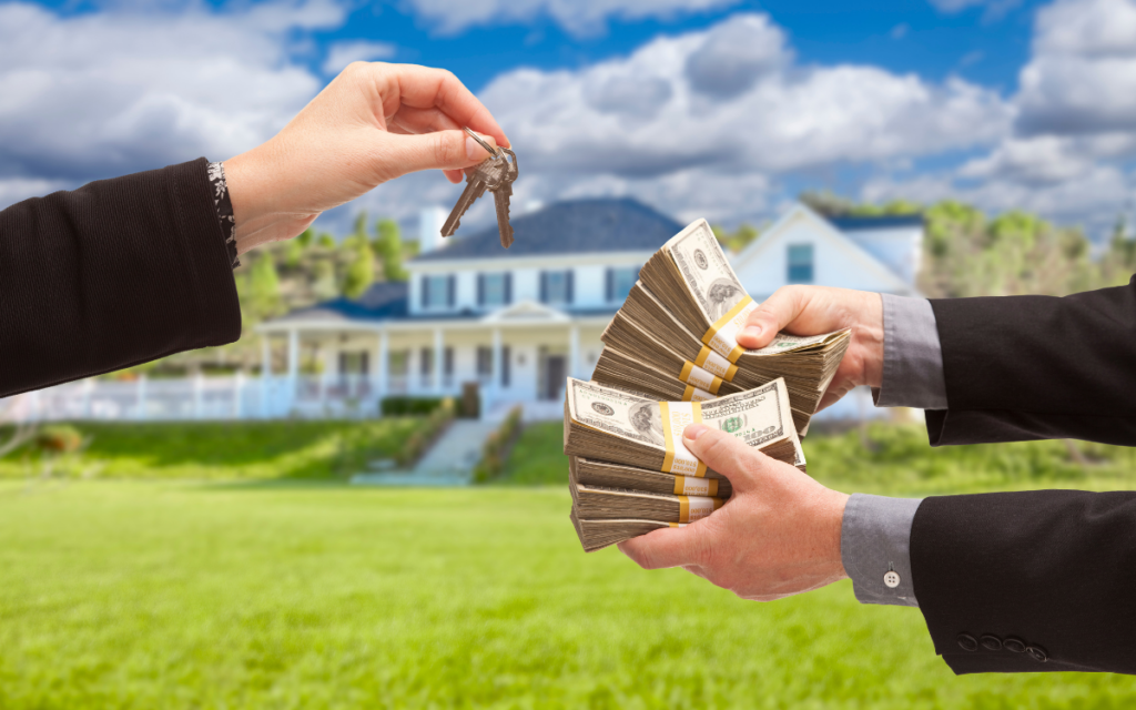 Stock image for a direct sale: the seller hands the keys to the buyer while the buyer provides a cash payment.