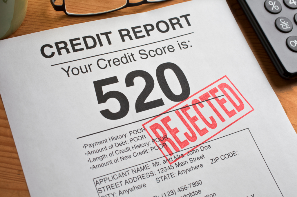 Image of a credit report with a low credit score that has been rejected for a loan request.