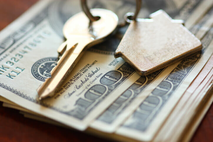 Keys on a stack of cash