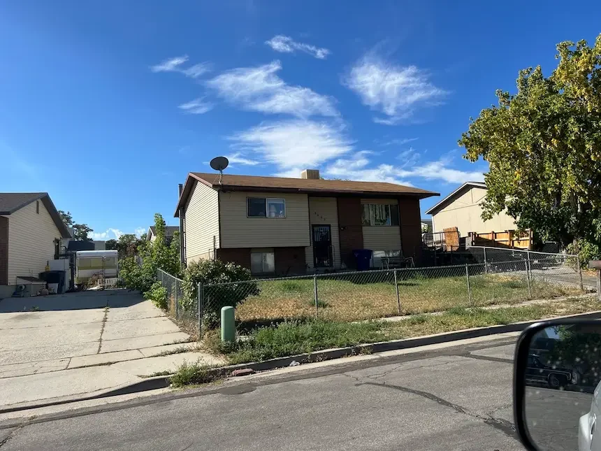 Kearns Utah split-level home with deferred maintenance — Utah Close Fast buys houses as-is for cash in Kearns with no repairs required