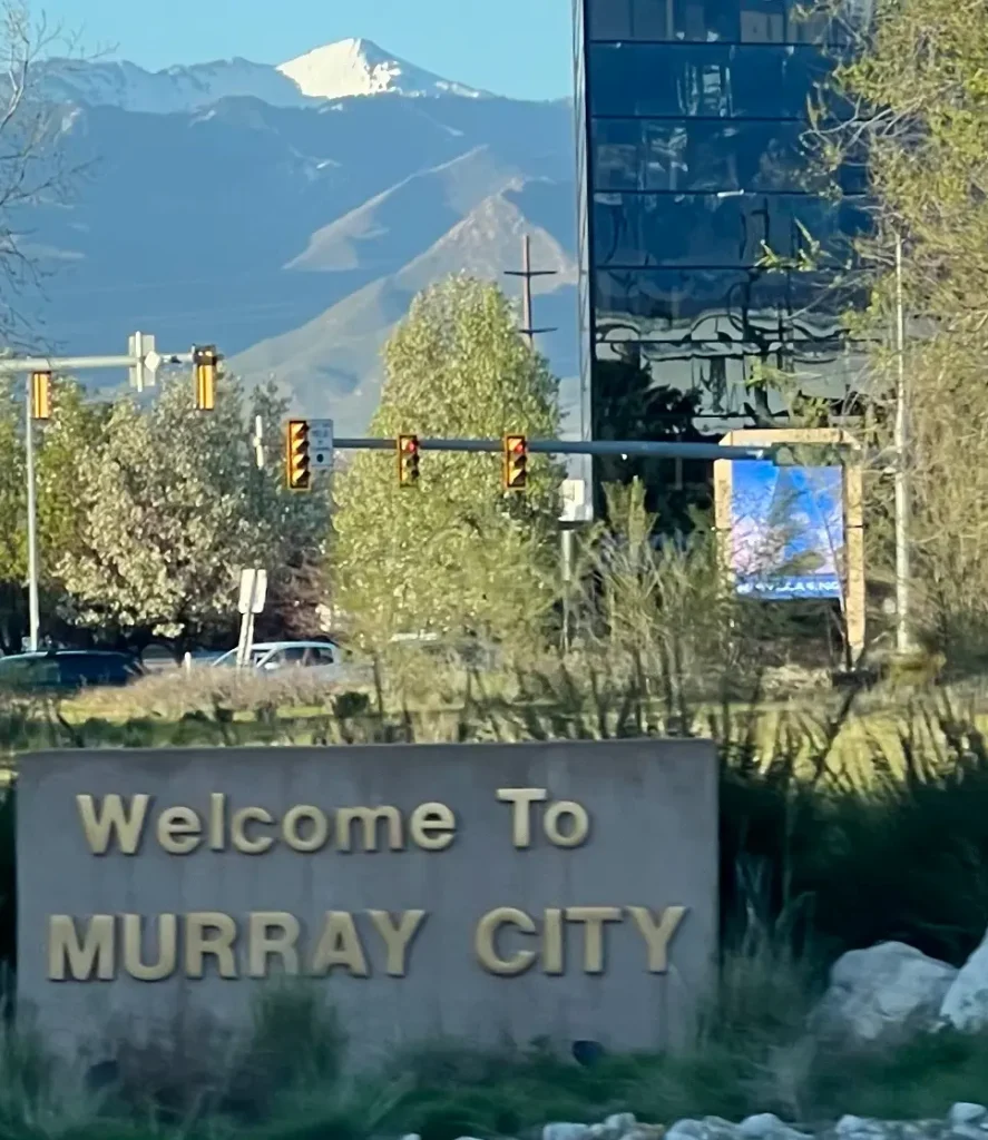 Street view in Murray Utah showing entrances to residential neighborhoods near Murray Park and IHC