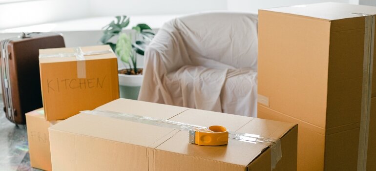 storing belongings in boxes to transform your home sale