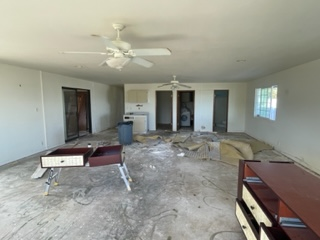 inside of a damaged house in hawaii that needs a lot of repairs