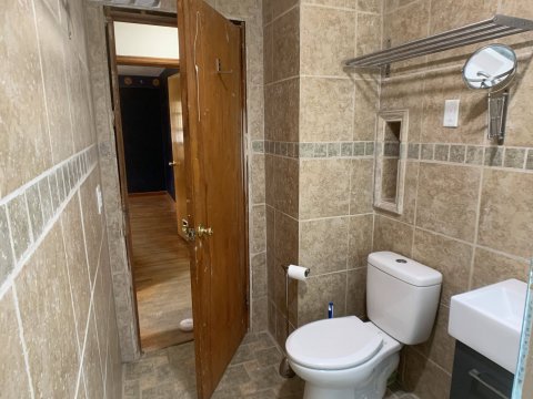 Tile to the ceiling bathroom