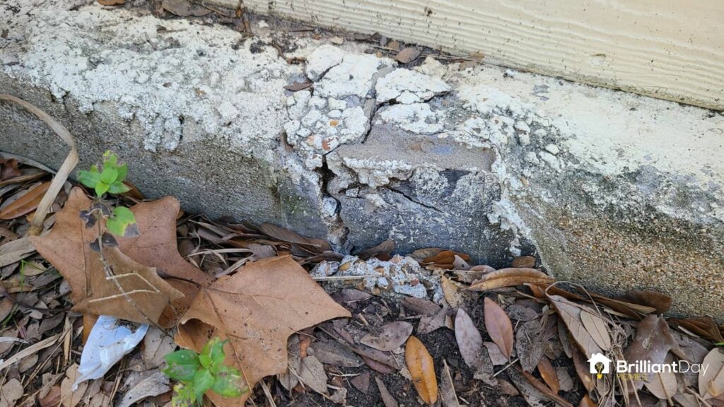 large crack in the slab foundation of a house