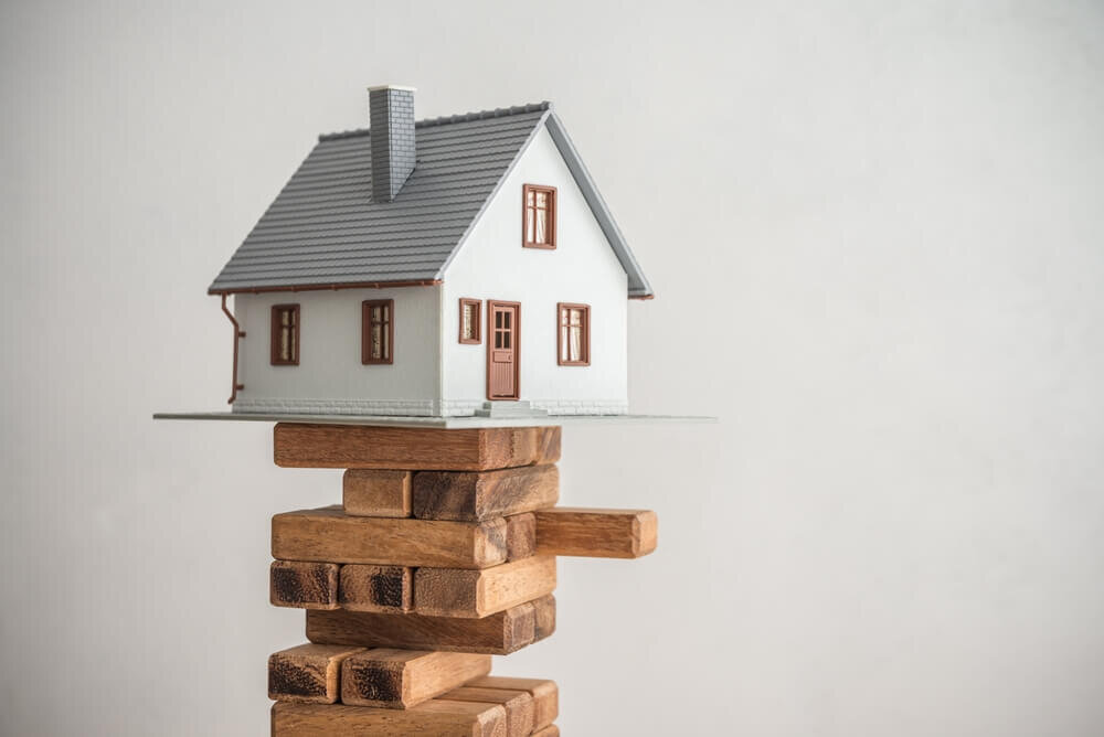 House over wood tower block