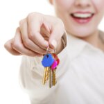 Handing keys to real estate agent