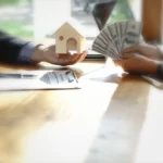 Confident homeowner reviewing a cash offer to sell their house on their terms with Southern Properties