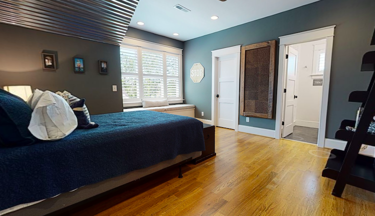 Bedroom virtual tour with a green bed which helps you sell your house fast in greenville nc