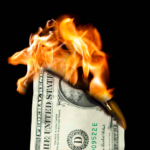 Burning dollar depicting the three things that will destroy your home value when selling your house in Wilmington NC