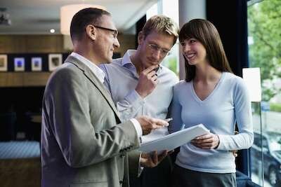 Top real estate agent in greenville creating a plan with a couple
