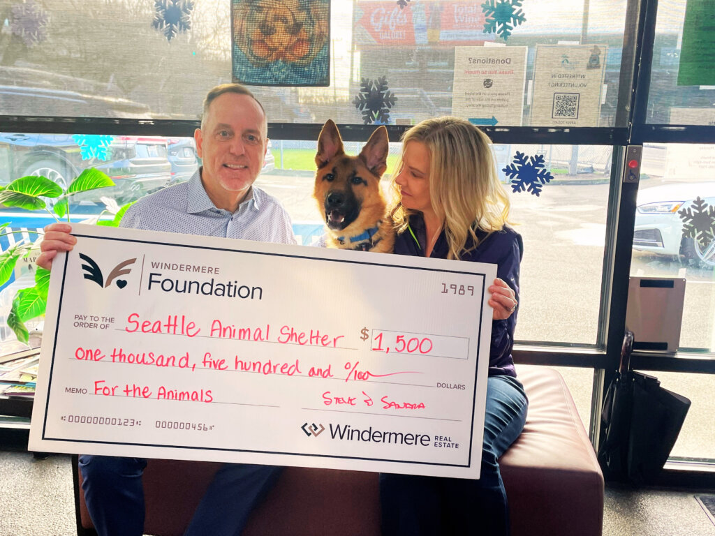 Steve and Sandra Hill with dog Todd, part of Brenner | Hill Real Estate’s referral program benefiting the Seattle Animal Shelter.
