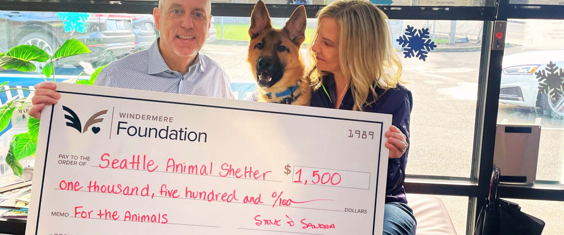 Steve and Sandra Hill with dog Todd, part of Brenner | Hill Real Estate’s referral program benefiting the Seattle Animal Shelter.