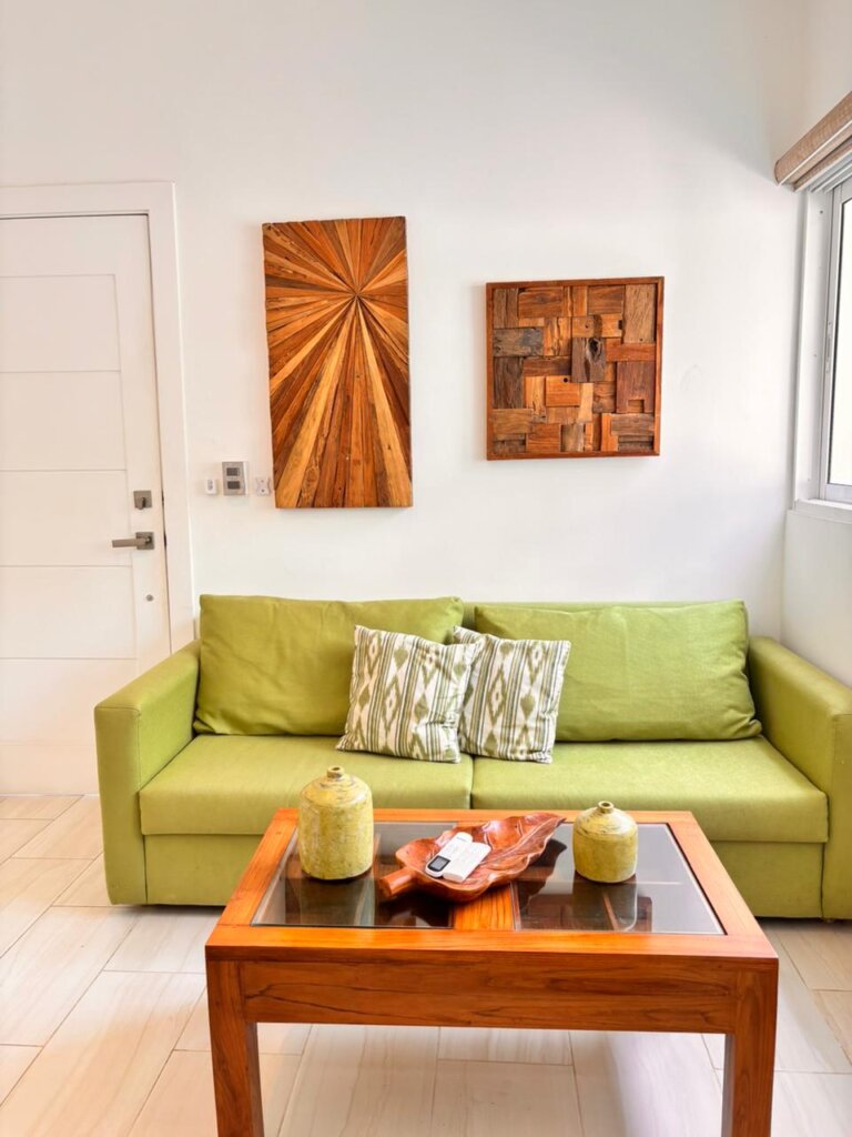 Bright 1-bedroom Punta Cana condo rental with modern kitchen, pool access, and steps from the beach.